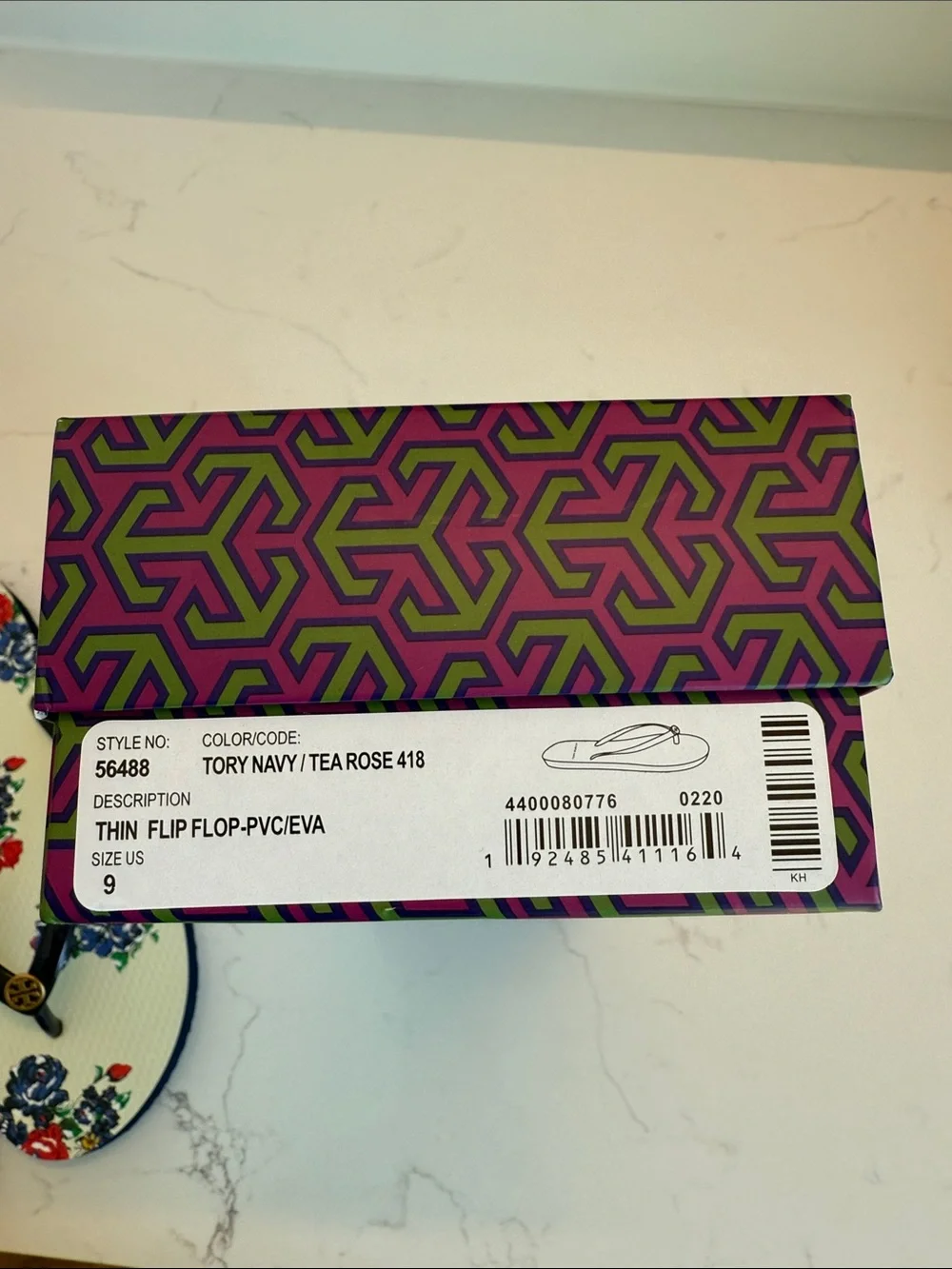 Tory Burch Floral Flip-Flop Sandals in Navy and Cream with Gold Logo